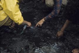 Crew excavating perishables in J9