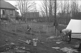 Two archaeologists working at site