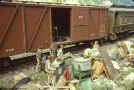 1960 Crew load gear onto way freight.